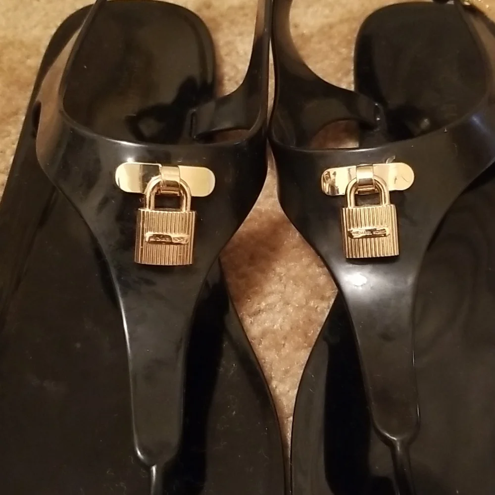 Michael Kors Black Jelly Thong Sandals with Gold Padlock Accent